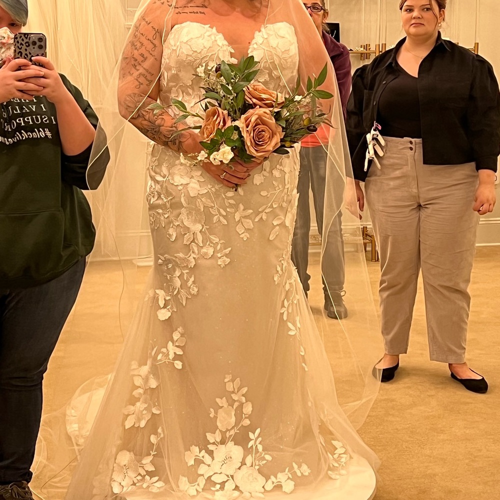 Brand new never worn still has tags never altered Abella bridal dress
